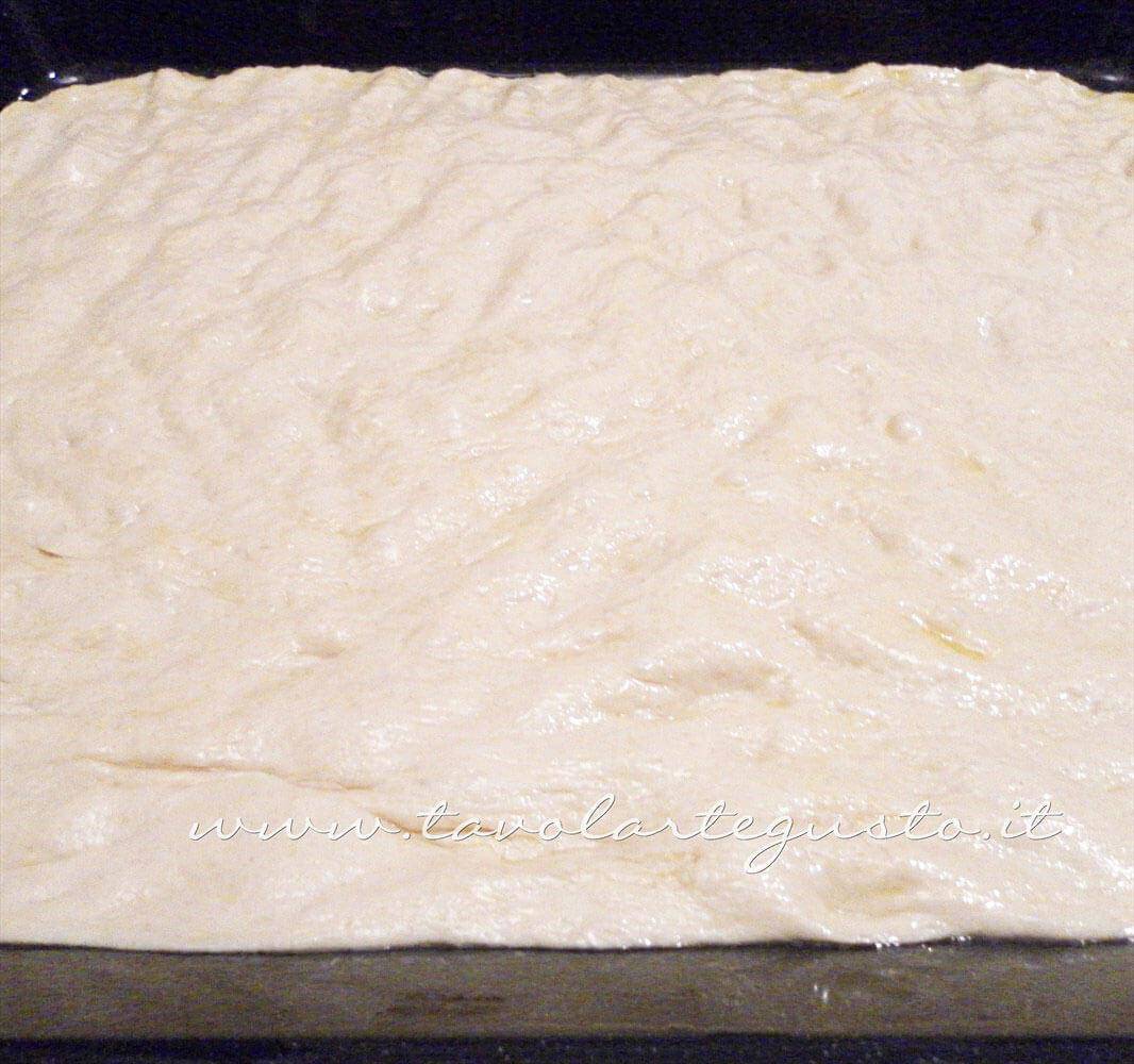 Stendere l'impasto della Pizza - Ricetta Pizza Marinara Stendere l'impasto della Pizza - Ricetta Pizza Marinara