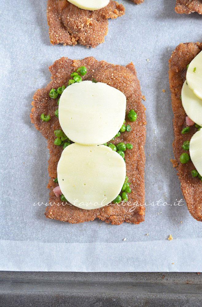 Aggiungere formaggio - Ricetta Cotolette con piselli Aggiungere formaggio - Ricetta Cotolette con piselli