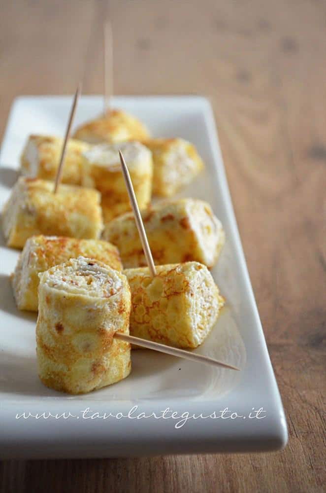 Rotolini di Crepes alla ricotta - Ricetta Rotolini di Crepes alla ricotta - Ricetta